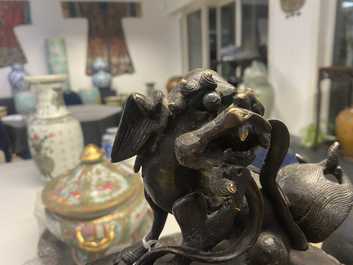 A large Chinese bronze censer and cover, Ming